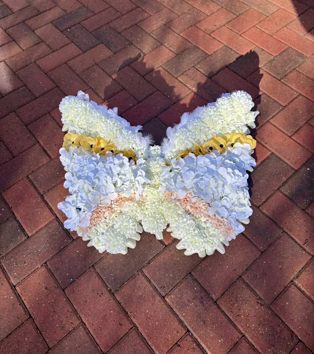Butterfly Tribute, artificial silk funeral tribute available to hire
